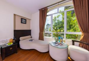 Posezení v ubytování Centre Point Hanoi Hotel