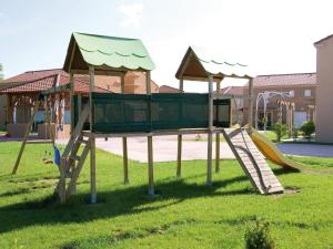 a park with a playground with a slide and a slope at Beautiful apartment in a picturesque city in the Dordogne in Bergerac