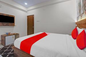En eller flere senger på et rom på Hotel Srh Pride