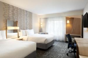 Postel nebo postele na pokoji v ubytování Courtyard by Marriott- Austin Round Rock