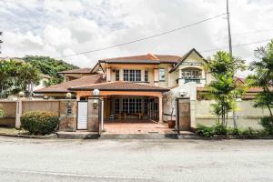 a house with a gate in front of it at Wangsa Maju Luxury Villa with Private Pool-12pax in Kuala Lumpur