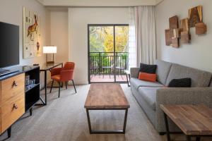 a living room with a couch and a table at Amara Resort & Spa in Sedona