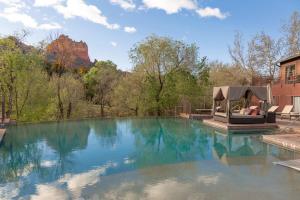 a swimming pool with a tent in the middle at Amara Resort & Spa in Sedona