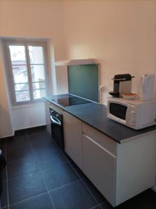 Afbeelding uit fotogalerij van O'Couvent - Appartement 441 - 3 chambres - 97 m2 - Quatrième étage in Salins-les-Bains