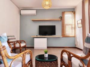 TV a/nebo společenská místnost v ubytování La Maison d'Isa