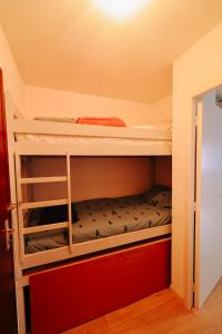 Posteľ alebo postele v izbe v ubytovaní Appart cosy proche de la plage.