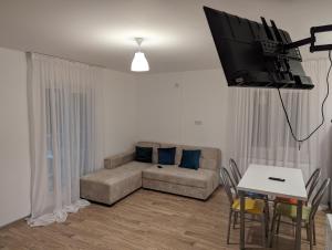TV a/nebo společenská místnost v ubytování Sunshine Inn Buriani