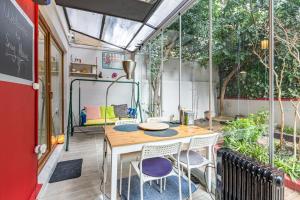 a tiny house with a table and chairs on a patio at Stylish in Istanbul