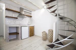 A kitchen or kitchenette at Privée Santorini