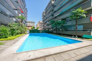 a swimming pool in the middle of a building at Pool House - Happy Rentals in Lugano