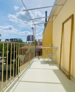 a balcony with a view of a city at Helle, grosse, zentrale Wohnung mit Balkon in Munich