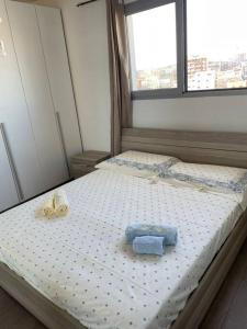 Кровать или кровати в номере Attico - Il Panorama