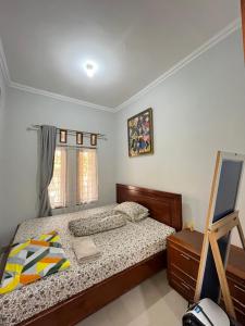 Postel nebo postele na pokoji v ubytování Guesthouse Hannia + 7 fotografií