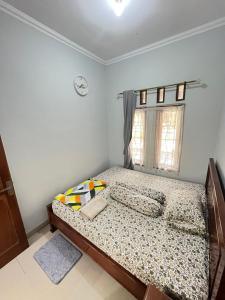 Postel nebo postele na pokoji v ubytování Guesthouse Hannia