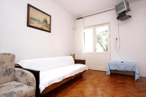 מיטה או מיטות בחדר ב-Apartments and rooms by the sea Pag - 3152