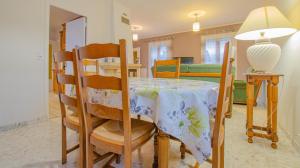 a dining room with a table and chairs at Gîte 10G263 in Arcis-sur-Aube