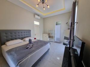 Μια τηλεόραση ή/και κέντρο ψυχαγωγίας στο Tanara Home Syariah