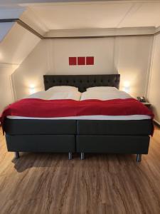 Postel nebo postele na pokoji v ubytování Hotel Balsthal