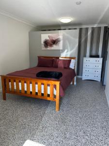 Postel nebo postele na pokoji v ubytování Clermont Guest House - Pet friendly + 1 fotografie