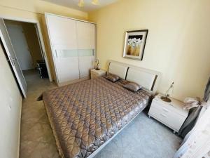 Postel nebo postele na pokoji v ubytování Lovely apartment with FREE parking Silver Springs