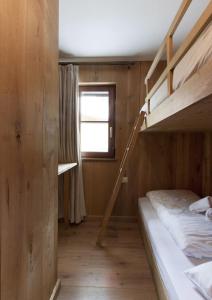 A bed or beds in a room at Appart Laijola