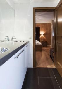 A bed or beds in a room at Appart Laijola