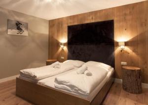 A bed or beds in a room at Appart Laijola