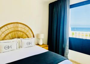 En eller flere senge i et værelse på Canaryislandshost l Frontline + 16 billeder