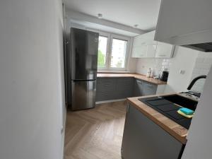 Kuchyňa alebo kuchynka v ubytovaní LTC Apartments Wzgórze św Maksymiliana