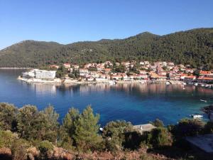 a small town on the shore of a lake at Villa Marija in Smokvica +5 photos