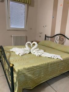 Cama o camas de una habitación en Hotel Esperia