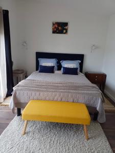 Кровать или кровати в номере Maison individuelle à Caen