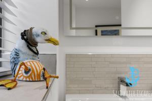 a bird toy sitting on top of a counter at Our Lookout at Grand Banks in Teignmouth