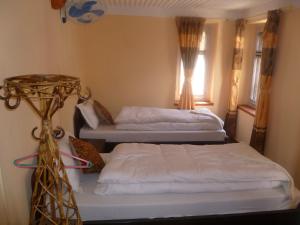 Postel nebo postele na pokoji v ubytování Andes House