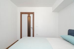 Ένα ή περισσότερα κρεβάτια σε δωμάτιο στο Zeus Suit Görükle