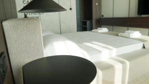 Postel nebo postele na pokoji v ubytování Hotel Nobilis Hall