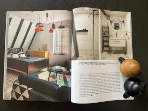 a page of a living room in a magazine at Długa Design Apartment - Old Town in Gdańsk