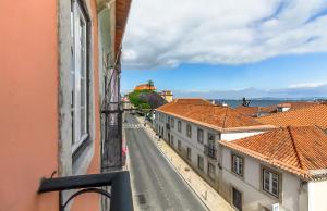 a view of a city street from a building at Santos Green Apartment in Lisbon