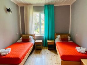 Postel nebo postele na pokoji v ubytování Guest House pesvebi