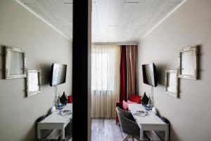 TV a/nebo společenská místnost v ubytování Flair Hotel zum Storchen