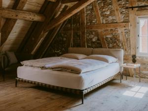 a bedroom with a bed in a attic at 1280 Krone in Geisingen