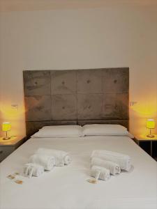 Giường trong phòng chung tại Hotel The Flash - Venturina Terme