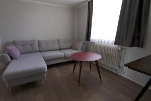 Posezení v ubytování P8 Ferienwohnung