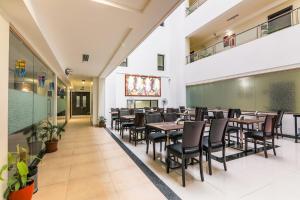 Posezení v ubytování Magnus Square Business Hotel near Pune Airport