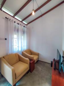Posezení v ubytování Peacock Village Pinnawala - Offer Alert! Elephant Welfare Program