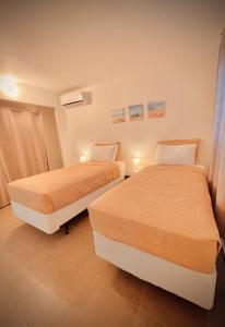 Postel nebo postele na pokoji v ubytování Magnifique appartement proche de la mer