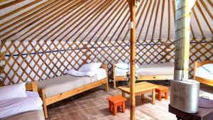 Postel nebo postele na pokoji v ubytování Khun Odod Resort, Khuvsgul province Mongolia