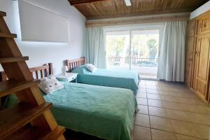 Postel nebo postele na pokoji v ubytování Bastide sur Mer with LOV