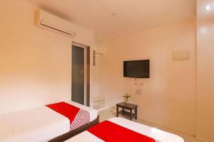 Cama o camas de una habitación en Villa Tomasa Beach Resort Panglao