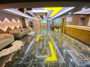 a lobby with a floor with the number z on it at Grand Nergiz Otel in Antalya